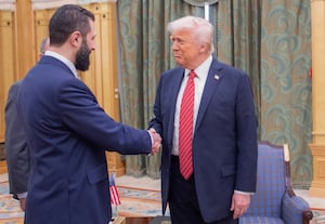 Trump signs executive order lifting Syria sanctions
